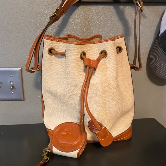 Dooney and Burke bucket bag with matching wallet
